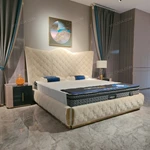 Cream Quilted Upholstered Bed with Patterned Stitching & Gold Stainless Steel Accents